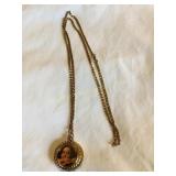 Gold toned pendant watch, Quartz, Japan, 28"