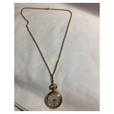 Caravelle gold tone pendant pocket watch