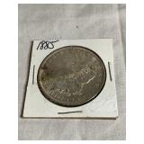 1885 Morgan silver dollar
