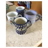 4 mugs - polish pottery,signed pottery ?,etc.