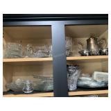 Contents of 2 cabinet shelf- - glassware, plates,