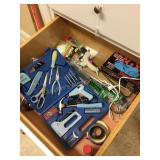 Content S of drawer, tools, gloves, tape,
