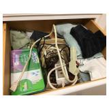 Contents of drawer - towels, Swifters, power