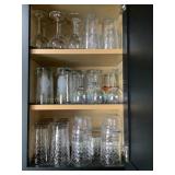 Contents of cupboard- 20+ glasses, 10+ goblets