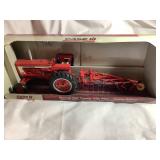 ERTL Case Farmall 706 tractor w/plow, dealer