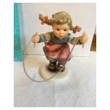 Goebel Hummel First issue jump for joy girl 5"h -