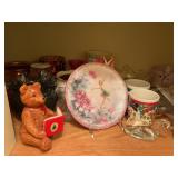Contents of shelf-tinker Bell plate, glassware,