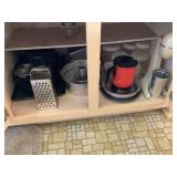 Contents of kitchen cabinet-bakeware, roaster,