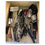 Contents of drawer- misc. kitchen utensils,