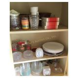 Contents of cabinet, coasters, timers, custard