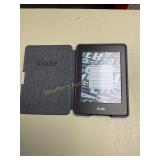 Kindle in purple case  working 3 1/2' x 4 3/4',