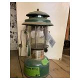 Coleman 220J series lantern, 12" tall, shows wear