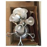 2 Disassembled ceiling fans, Hunter has 4 lights,