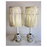 2 Vtg. Milk glass lamps 22"h