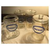 4 Glass medical apothecary jars w/3 lids, 7"H