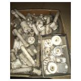 Porcelain Fence insulators, show wear