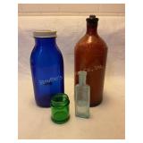 4 colored glass bottles, 8" tallest