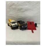 2 Tonka trucks & Nylint trailer 9" long