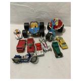 10 toy cars- hot wheels, tonka, etc, show wear