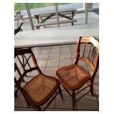 Two wicker chairs