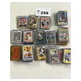Large lot of baseball cards in top loaders