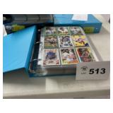 large binder of football cards