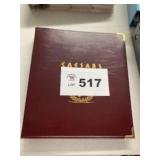 large binder of football cards