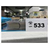 large binder of football cards