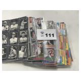 several pages of baseball cards HOF cards 70s to