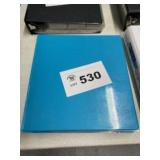 large binder of football cards