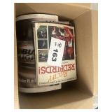 Large box of sports paper items