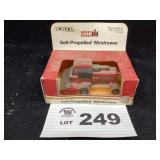 1/64 SCALE ERTL CASE IH SELF PROPELLED WINDROWER