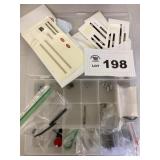 CONTAINER WITH TOY TRACTOR PARTS AND DECALS