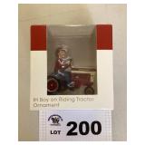 IH BOY ON RIDING TRACTOR ORNAMENT