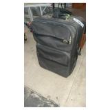 AMERICAN TOURISTER SUITCASE