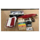 CAR VAC, AMERICAN FLAG, POLAROID CAMERA