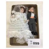 BRIDE AND GROOM PORCELAIN DOLLS WITH STANDS