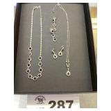 BLACK AND WHITE CRYSTAL NECKLACES AND EARRINGS