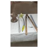 BRUSH, CAMPFIRE IRON, SPOOL OF CABLE, LOOPERS