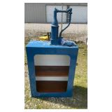 OIL CONTAINER ON DISPLAY CABINET