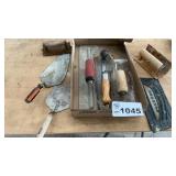 TROWELS