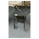 ROLLING WALKER WITH SEAT AND BRAKES