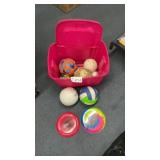 TOTE OF BALLS AND FRISBEES
