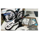 Wii GAMING SYSTEM AND WIRELESS GUITAR