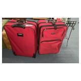 2 LARGE RED SUITCASES