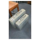 2 GRAY SUITCASES