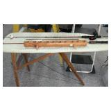 2 FISHING RODS, 1 REEL, WOOD IRONING BOARD