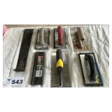 TROWELS