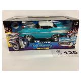 1:18 SCALE - MUSCLE MACHINES 57 CAMARO - TOO COOL