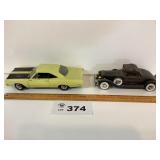 ERTL PLYMOUTH / BLACK BATTERY OPERATED CAR
